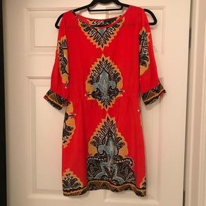 Open shoulder, open back dress